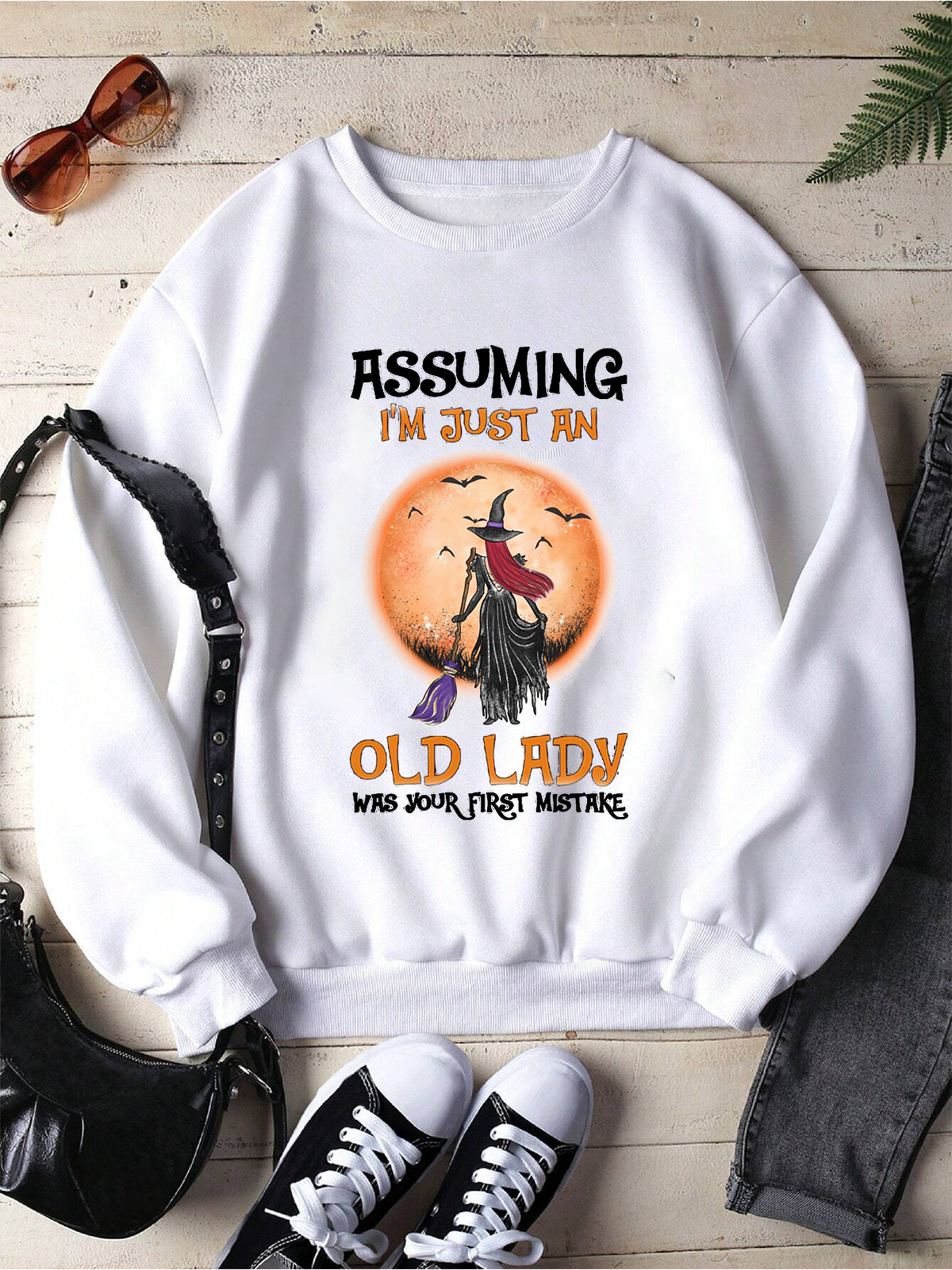 Assuming I'm Just An Old Lady Was Your First Mistake witch Halloween Sweatshirt